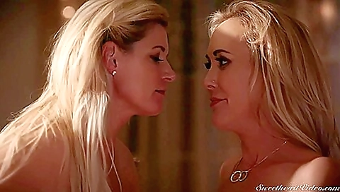 Blonde with big tits enjoys licking her lover's cunny