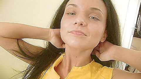 Brunette teen is playing with a vibrator and her pussy