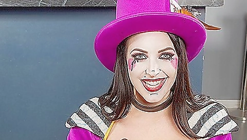 Sexy and horny girl with beautiful boobs is wearing a sexy hat