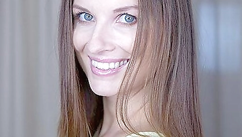 Hot brunette girl naked on the bed in lingerie and panties