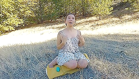 Tattooed brunette in a white top and black shorts in vr