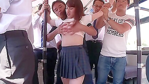 Asian teen gets fucked on the bus in a group sex movie
