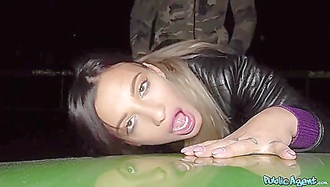 Brunette babe with a tattooed body shows off on a casting