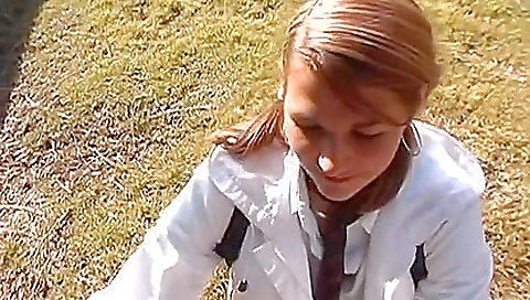 Beautiful redhead 18+ girl is in a outdoor scenario